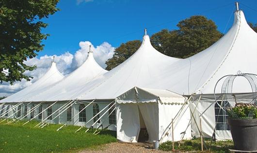 a line of sleek and modern portable toilets ready for use at an upscale corporate event in Nanuet, NY